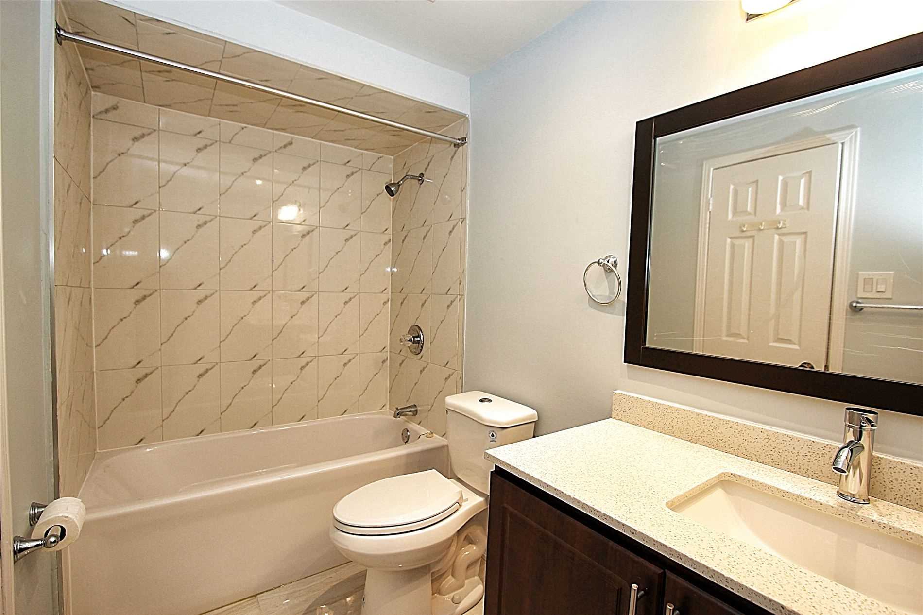 Full bathroom with tub