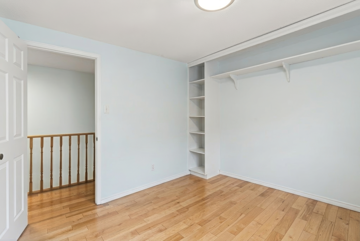 Bedroom with closet organizer
