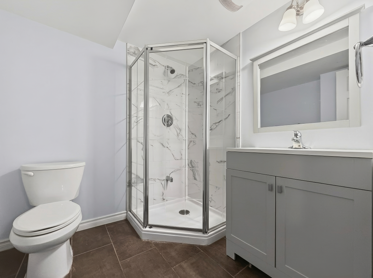 Basement bathroom with glass shower